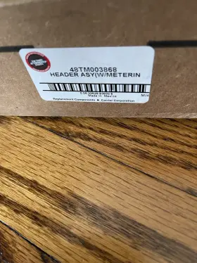 48TM003868 CARRIER CORPORATION Header